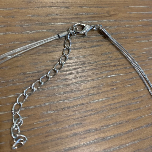 Metal pendant. Geometric pattern under dark amber enamel. Retro design on wire - Picture 5 of 6